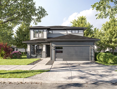 a house with a gray garage and a green lawn